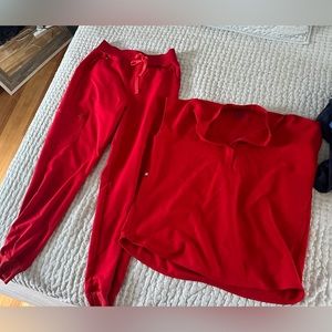 Red FIG scrubs. Great condition, never put in dryer.